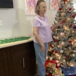 Old Woman with Christmas Tree
